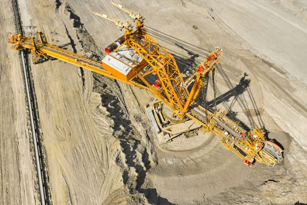 Top view of a bucket wheel excavator mining coal in an open pit mine