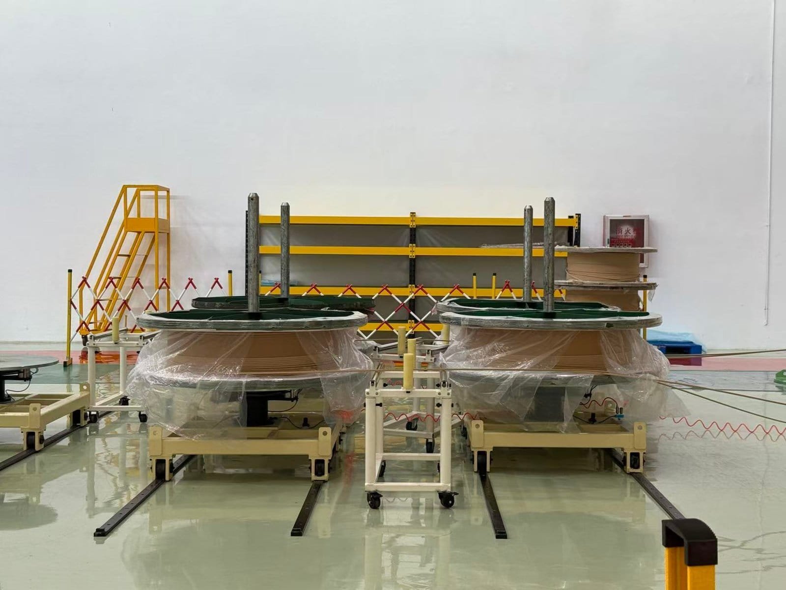 High-voltage transformer prototypes undergoing testing in a manufacturing facility, emphasizing innovative Taishan Transformer electrical and power transmission solutions.