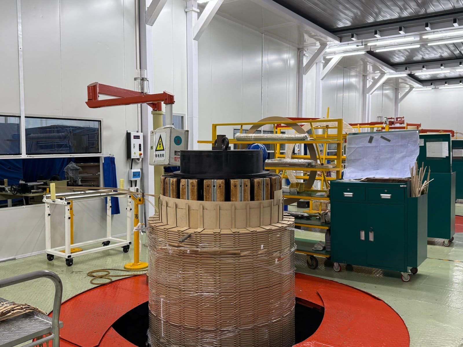 High-voltage transformer core being assembled in a manufacturing facility at Taishan Transformer, showcasing advanced industrial processing and quality engineering for power transformers.