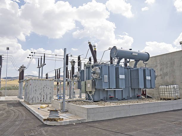 High-voltage power transformer at Taishan Transformer factory, showcasing industrial electrical equipment used for power distribution and transmission.