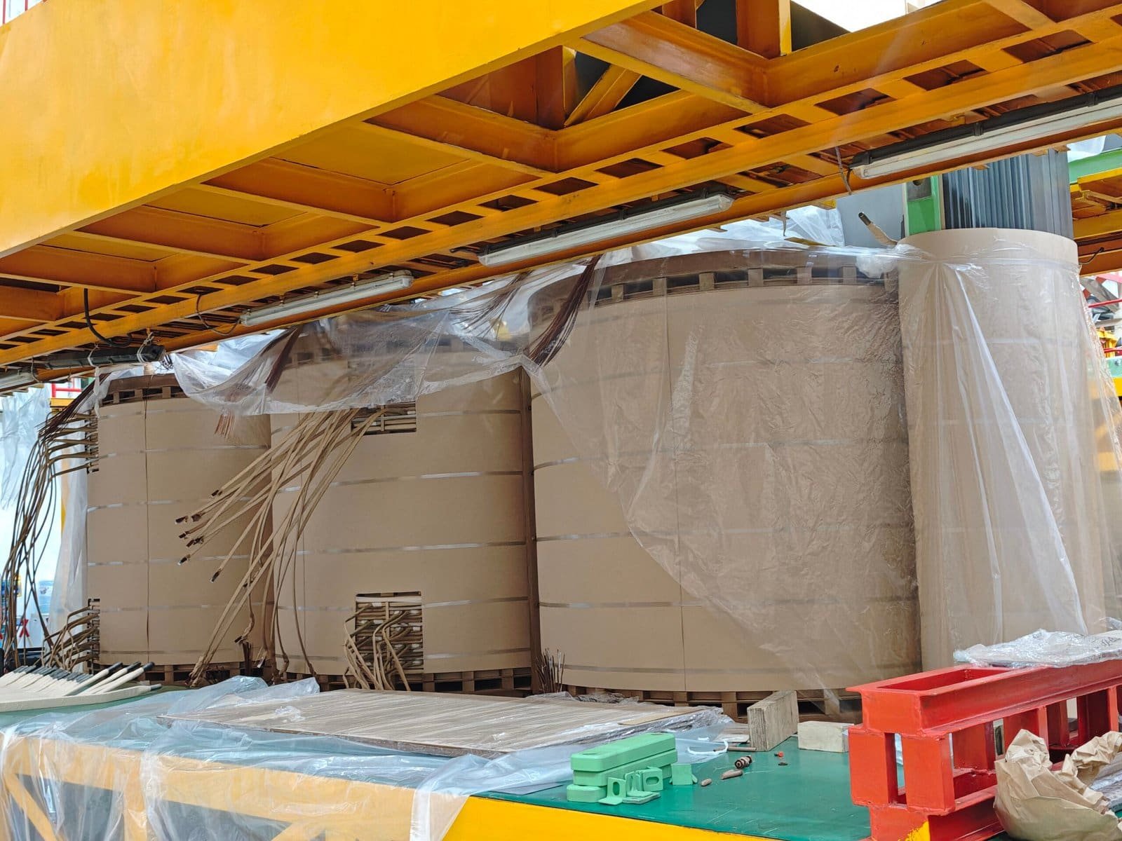 High-capacity power transformer at Taishan Transformer factory, showcasing advanced manufacturing and quality control processes for reliable electrical energy distribution.